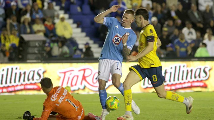 Alvaro Fidalgo #8  of America and Brian Rodríguez #7 of...