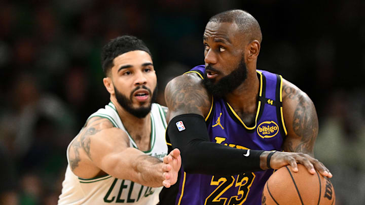 Mar 8, 2025; Boston, Massachusetts, USA; Los Angeles Lakers forward LeBron James (23) controls the ball against Boston Celtics forward Jayson Tatum (0) during the fourth quarter at the TD Garden. Mandatory Credit: Brian Fluharty-Imagn Images Mar 8, 2025; Boston, Massachusetts, USA; Los Angeles Lakers forward LeBron James (23) controls the ball against Boston Celtics forward Jayson Tatum (0) during the fourth quarter at the TD Garden. Mandatory Credit: Brian Fluharty-Imagn Images
