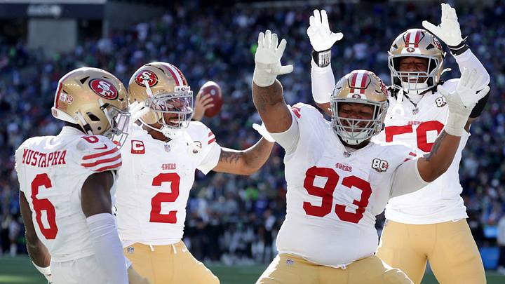 Oct 11, 2026; Seattle, Washington, USA; San Francisco 49ers defensive tackle Gracen Halton (93) celebrates with cornerback Deommodore Lenoir (2), safety Malik Mustapha (6) and linebacker Ogbo Okoronkwo (59) after forcing and recovering a fumble for a touchdown against the Seattle Seahawks during the first half at Lumen Field. Mandatory Credit: Joe Nicholson-Imagn Images TPX IMAGES OF THE DAY Oct 11, 2026; Seattle, Washington, USA; San Francisco 49ers defensive tackle Gracen Halton (93) celebrates with cornerback Deommodore Lenoir (2), safety Malik Mustapha (6) and linebacker Ogbo Okoronkwo (59) after forcing and recovering a fumble for a touchdown against the Seattle Seahawks during the first half at Lumen Field. Mandatory Credit: Joe Nicholson-Imagn Images TPX IMAGES OF THE DAY