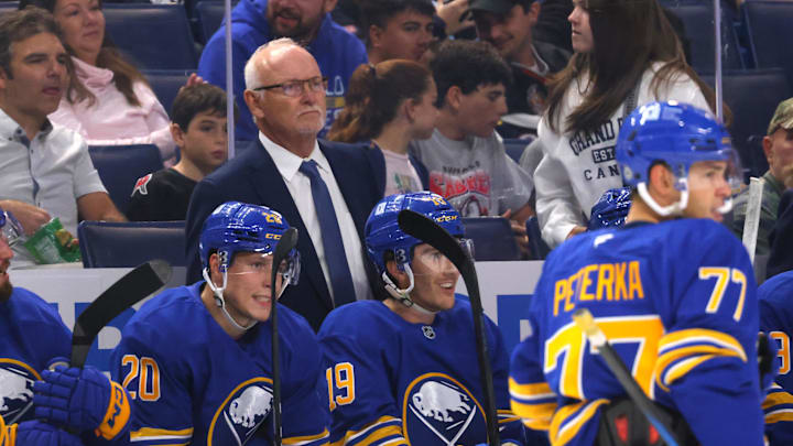 Sabres head coach Ruff looks on at the ice