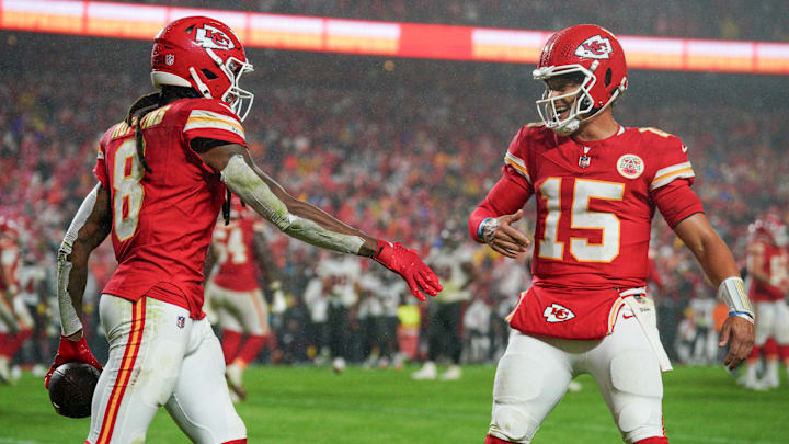 Nov 4, 2024; Kansas City, Missouri, USA; Kansas City Chiefs wide receiver DeAndre Hopkins (8) celebrates with quarterback Patrick Mahomes (15) after scoring against the Tampa Bay Buccaneers during the second half at GEHA Field at Arrowhead Stadium. Mandatory Credit: Denny Medley-Imagn Images