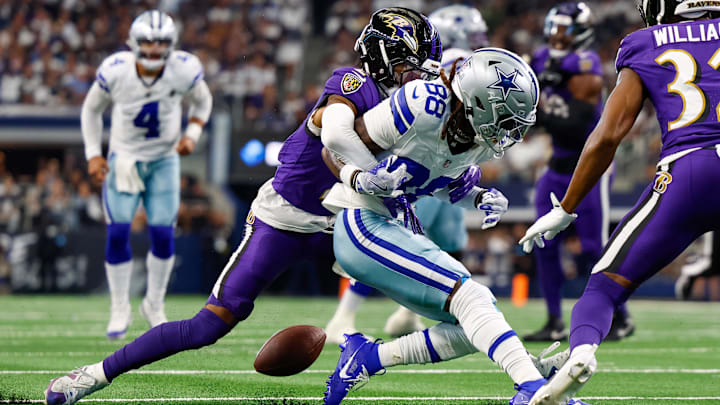 Baltimore Ravens cornerback Nate Wiggins (2) strips the ball away from Dallas Cowboys wide receiver CeeDee Lamb (88) during the second quarter at AT&T Stadium. Baltimore Ravens cornerback Nate Wiggins (2) strips the ball away from Dallas Cowboys wide receiver CeeDee Lamb (88) during the second quarter at AT&T Stadium.