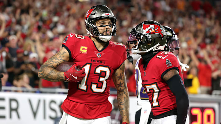 Oct 21, 2024; Tampa, Florida, USA; Tampa Bay Buccaneers wide receiver Mike Evans (13) catches the ball for a touchdown  against the Baltimore Ravens during the first quarter at Raymond James Stadium. Mandatory Credit: Kim Klement Neitzel-Imagn Images