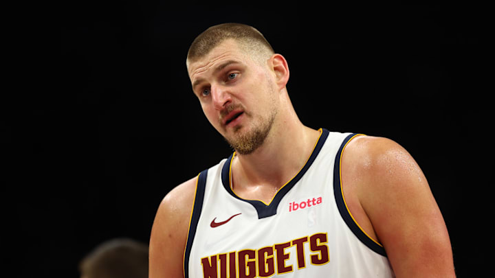 Nov 29, 2025; Phoenix, Arizona, USA; Denver Nuggets center Nikola Jokic (15) against the Phoenix Suns at the Mortgage Matchup Center. Nov 29, 2025; Phoenix, Arizona, USA; Denver Nuggets center Nikola Jokic (15) against the Phoenix Suns at the Mortgage Matchup Center.