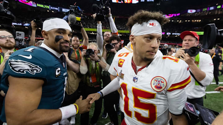 Feb 9, 2025; New Orleans, LA, USA; Philadelphia Eagles quarterback Jalen Hurts (1) greets Kansas City Chiefs quarterback Patrick Mahomes (15) following Super Bowl LIX at Ceasars Superdome. Mandatory Credit: Mark J. Rebilas-Imagn Images Feb 9, 2025; New Orleans, LA, USA; Philadelphia Eagles quarterback Jalen Hurts (1) greets Kansas City Chiefs quarterback Patrick Mahomes (15) following Super Bowl LIX at Ceasars Superdome. Mandatory Credit: Mark J. Rebilas-Imagn Images