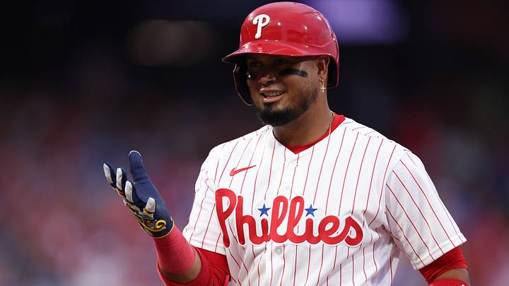 Philadelphia Phillies second baseman Luis Arraez (4) reacts after hitting a single.