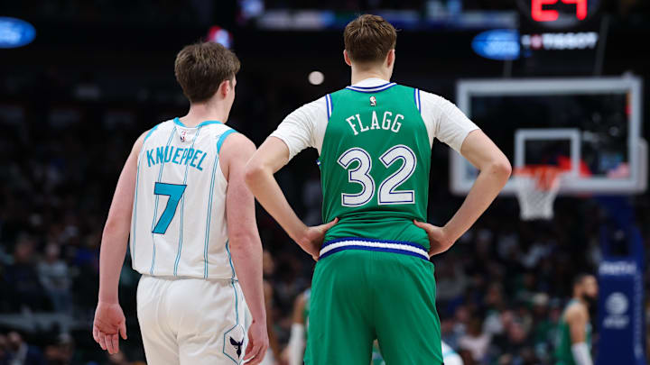 Charlotte Hornets guard Kon Knueppel (7) stands with Dallas Mavericks forward Cooper Flagg 