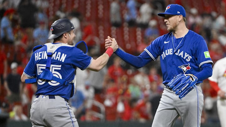 Jun 9, 2025; St. Louis, Missouri, USA;  Toronto Blue Jays relief pitcher Jeff Hoffman (23) celebrates with catcher Tyler Heineman (55) after the Blue Jays defeated the St. Louis Cardinals in ten innings at Busch Stadium. Mandatory Credit: Jeff Curry-Imagn Images