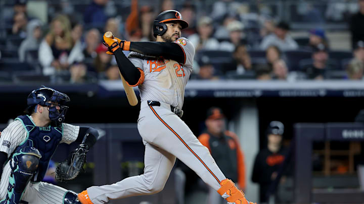 Sep 25, 2024; Bronx, New York, USA; Baltimore Orioles right fielder Anthony Santander (25) follows through on an RBI double against the New York Yankees during the fourth inning at Yankee Stadium.