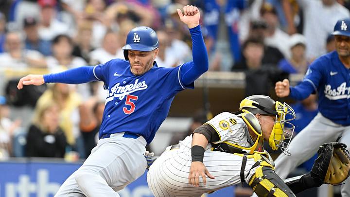 Jun 27, 2026; San Diego, California, USA; Los Angeles Dodgers first baseman Freddie Freeman (5) scores ahead of the throw to San Diego Padres catcher Freddy Fermin (54) during the sixth inning at Petco Park. Mandatory Credit: Denis Poroy-Imagn Images Jun 27, 2026; San Diego, California, USA; Los Angeles Dodgers first baseman Freddie Freeman (5) scores ahead of the throw to San Diego Padres catcher Freddy Fermin (54) during the sixth inning at Petco Park. Mandatory Credit: Denis Poroy-Imagn Images