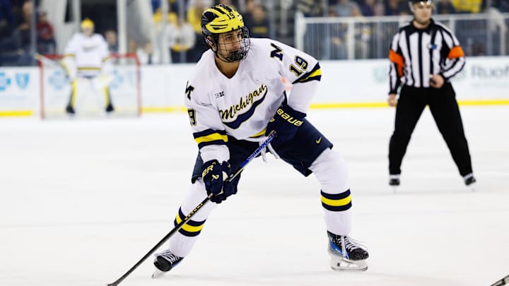 Mar 7, 2025; Ann Arbor, MI, USA; Michigan Wolverines forward Michael Hage (19) skates with the puck against Penn State during a Big Ten Tournament quarter final game at Yost Arena. Mandatory Credit: Rick Osentoski-Imagn Images Mar 7, 2025; Ann Arbor, MI, USA; Michigan Wolverines forward Michael Hage (19) skates with the puck against Penn State during a Big Ten Tournament quarter final game at Yost Arena. Mandatory Credit: Rick Osentoski-Imagn Images