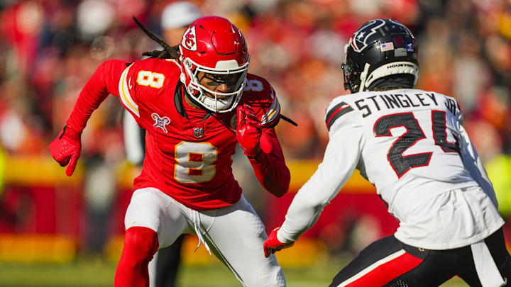 Dec 21, 2024; Kansas City, Missouri, USA; Kansas City Chiefs wide receiver DeAndre Hopkins (8) runs against Houston Texans cornerback Derek Stingley Jr. (24) during the first half at GEHA Field at Arrowhead Stadium.