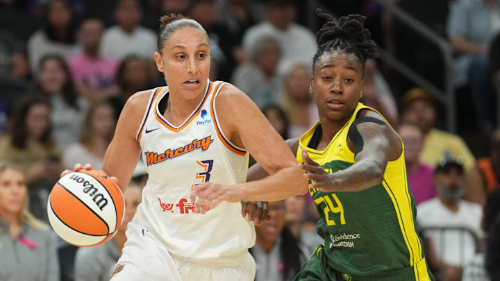 Aug 5, 2023; Phoenix, Arizona, USA; Phoenix Mercury guard Diana Taurasi (3) dribbles against Seattle Storm guard Jewell Loyd (24) during the first half at Footprint Center. Mandatory Credit: Joe Camporeale-Imagn Images