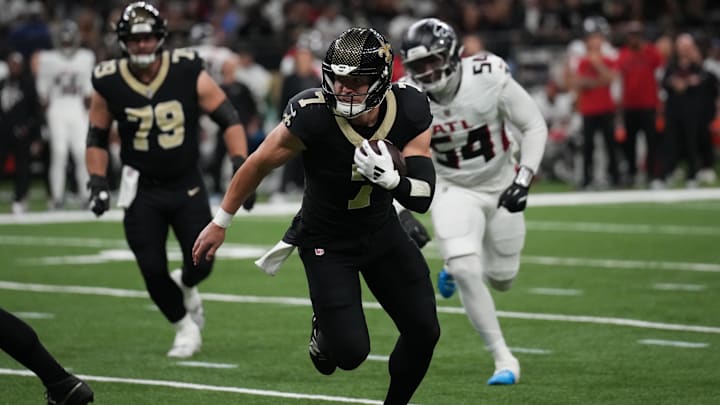 Nov 23, 2025; New Orleans, Louisiana, USA; New Orleans Saints quarterback Taysom Hill (7) carries the ball against the Atlanta Falcons during the first half at Caesars Superdome. Nov 23, 2025; New Orleans, Louisiana, USA; New Orleans Saints quarterback Taysom Hill (7) carries the ball against the Atlanta Falcons during the first half at Caesars Superdome.
