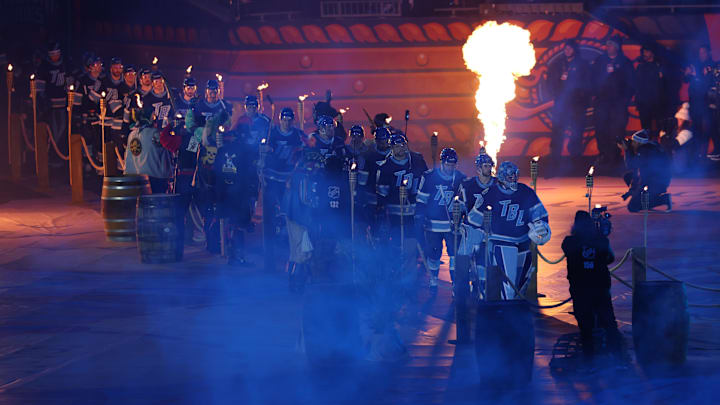 Feb 1, 2026; Tampa Bay, Florida, USA; The Tampa Bay Lightning make their entrance to the ice in the 2026 Stadium Series ice hockey game against the Boston Bruins at Raymond James Stadium. Mandatory Credit: Nathan Ray Seebeck-Imagn Images Feb 1, 2026; Tampa Bay, Florida, USA; The Tampa Bay Lightning make their entrance to the ice in the 2026 Stadium Series ice hockey game against the Boston Bruins at Raymond James Stadium. Mandatory Credit: Nathan Ray Seebeck-Imagn Images
