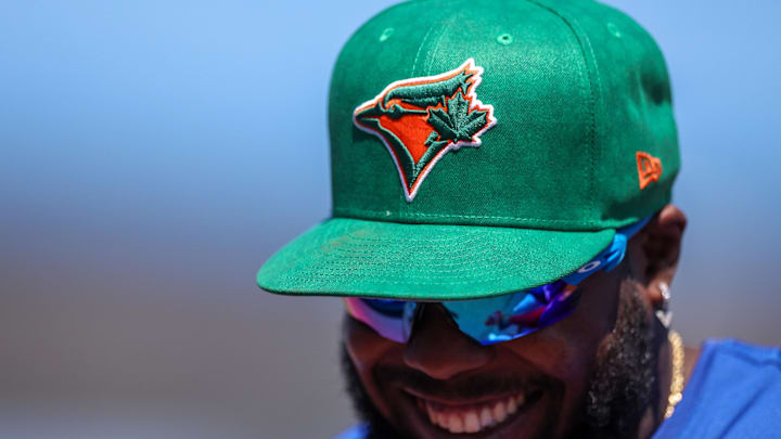 Toronto Blue Jays first baseman Vladimir Guerrero Jr. (27) wears a green MLB hat for St. Patrick’s day during a spring training game against the New York Yankees at TD Ballpark on March 17. Toronto Blue Jays first baseman Vladimir Guerrero Jr. (27) wears a green MLB hat for St. Patrick’s day during a spring training game against the New York Yankees at TD Ballpark on March 17.