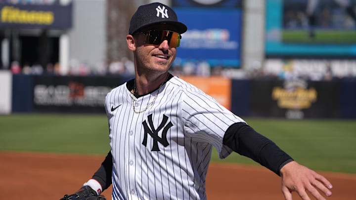 Feb 21, 2025; Tampa, Florida, USA; New York Yankees outfielder Cody Bellinger (35) waves to fans during the spring training game against the Tampa Bay Rays at George M. Steinbrenner Field. 