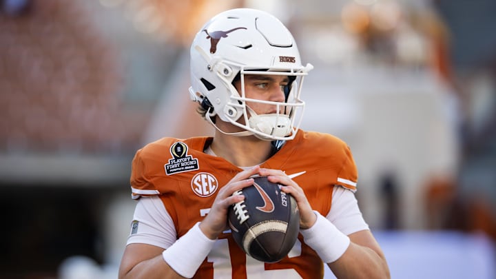 Dec 21, 2024; Austin, Texas, USA; Texas Longhorns quarterback Arch Manning (16) against the Clemson Tigers during the CFP National playoff first round at Darrell K Royal-Texas Memorial Stadium. Mandatory Credit: Mark J. Rebilas-Imagn Images