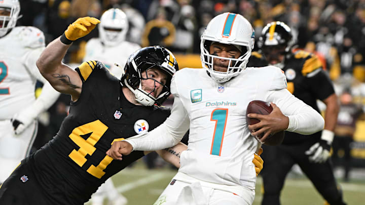 Pittsburgh Steelers linebacker Payton Wilson (41) sacks Miami Dolphins quarterback Tua Tagovailoa (1) in the third quarter at Acrisure Stadium. Pittsburgh Steelers linebacker Payton Wilson (41) sacks Miami Dolphins quarterback Tua Tagovailoa (1) in the third quarter at Acrisure Stadium.