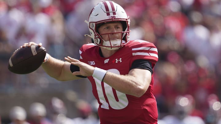 Sep 14, 2024; Madison, Wisconsin, USA;  Wisconsin Badgers quarterback Tyler Van Dyke (10) throws a pass during the first quarter against the Alabama Crimson Tide at Camp Randall Stadium. Mandatory Credit: Jeff Hanisch-Imagn Images