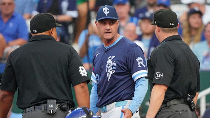 Jul 26, 2024; Kansas City, Missouri, USA; Kansas City Royals manager Matt Quatraro (33) argues a called strike with home plate umpire Fieldin Culbreth (25) against the Chicago Cubs in the first inning at Kauffman Stadium. Mandatory Credit: Denny Medley-Imagn Images