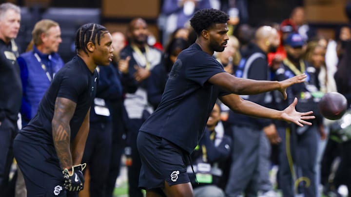 Apr 4, 2025; Boulder, CO, USA; Colorado Buffaloes quarterback Shedeur Sanders (2) takes a snap at the University of Colorado NFL Showcase at the CU Indoor Practice Facility. Apr 4, 2025; Boulder, CO, USA; Colorado Buffaloes quarterback Shedeur Sanders (2) takes a snap at the University of Colorado NFL Showcase at the CU Indoor Practice Facility.