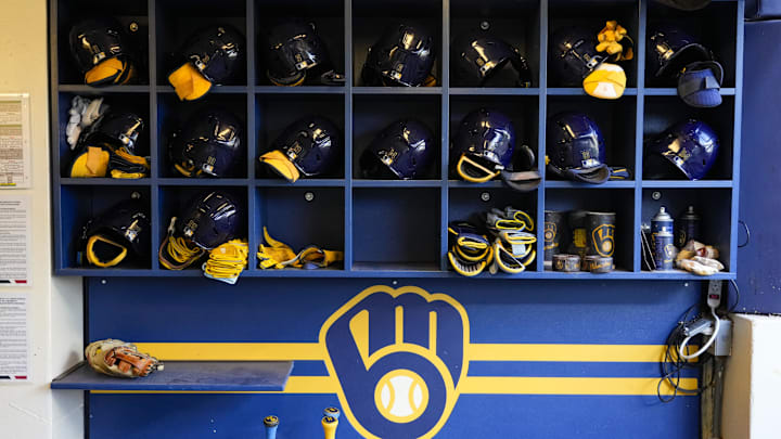 Sep 17, 2024; Milwaukee, Wisconsin, USA;  General view of batting helmets inside the Milwaukee Brewers dugout prior to the game against the Philadelphia Phillies at American Family Field. Mandatory Credit: Jeff Hanisch-Imagn Images