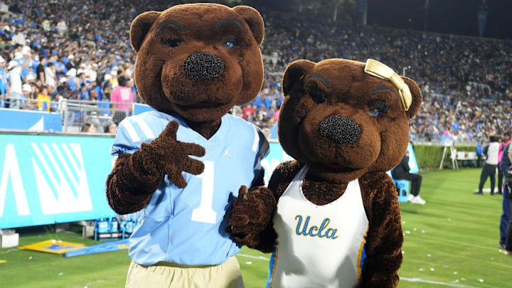 Oct 28, 2023; Pasadena, California, USA; UCLA Bruins mascots Joe Bruin (left) and Josephine Bruin pose in the second half against the Colorado Buffaloes at Rose Bowl.  Mandatory Credit: Kirby Lee-Imagn Images