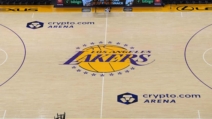 Dec 18, 2023; Los Angeles, California, USA; The Los Angeles Lakers logo at center court at the Crypto.com Arena. Mandatory Credit: Kirby Lee-Imagn Images Dec 18, 2023; Los Angeles, California, USA; The Los Angeles Lakers logo at center court at the Crypto.com Arena. Mandatory Credit: Kirby Lee-Imagn Images