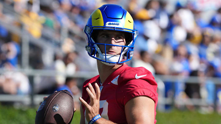 Jul 23, 2025; Los Angeles, CA, USA; Los Angeles Rams quarterback Stetson Bennett (13) throws the ball during training camp at Loyola Marymount University. Mandatory Credit: Kirby Lee-Imagn Images