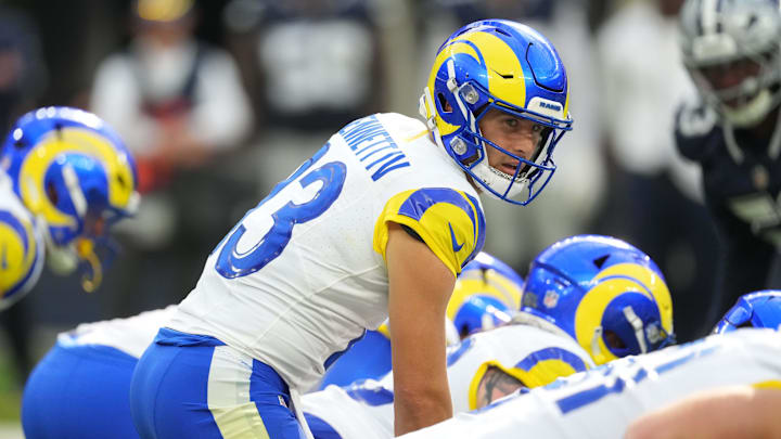 Aug 9, 2025; Inglewood, California, USA; Los Angeles Rams quarterback Stetson Bennett IV (13) takes the snap against the Dallas Cowboys in the first half at SoFi Stadium. Mandatory Credit: Kirby Lee-Imagn Images