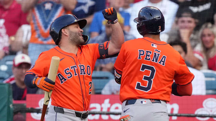 Jun 20, 2025; Anaheim, California, USA; Houston Astros shortstop Jeremy Pena (3) celebrates with designated hitter Jose Altuve (27) after hitting a home run in the first inning against the Los Angeles Angels at Angel Stadium. 