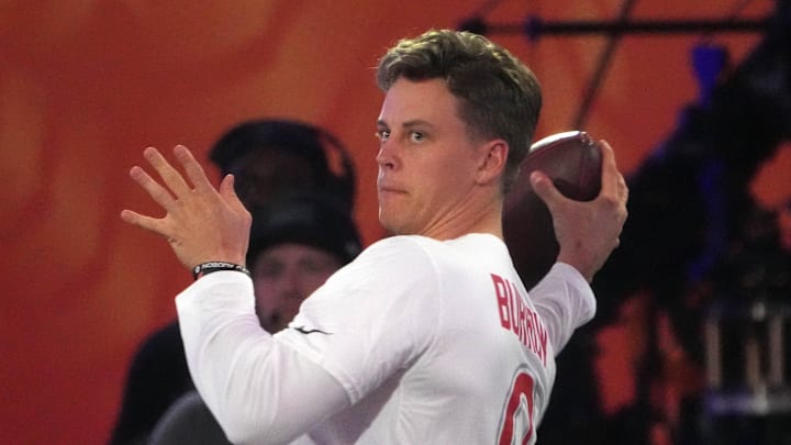 Jan 30, 2025; Orlando, FL, USA; AFC quarterback Joe Burrow of the Cincinnati Bengals throws the ball during the Passing the Test event at the Pro Bowl Skills Challenge at Nicholson Fieldhouse. Mandatory Credit: Kirby Lee-Imagn Images