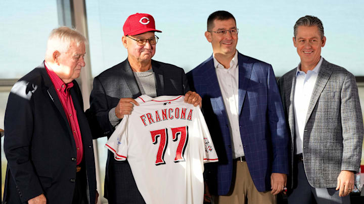 New Cincinnat Reds manager Terry Francona holds his new jersey on stage with (left to right) team owner Bob Castellini, President of Baseball Operation, Nick Krall, and General Manager Brad Meador, during an event to introduce the new manager of the Cincinnati Reds at Great American Ball Park in downtown Cincinnati on Monday, Oct. 7, 2024. New Cincinnat Reds manager Terry Francona holds his new jersey on stage with (left to right) team owner Bob Castellini, President of Baseball Operation, Nick Krall, and General Manager Brad Meador, during an event to introduce the new manager of the Cincinnati Reds at Great American Ball Park in downtown Cincinnati on Monday, Oct. 7, 2024.