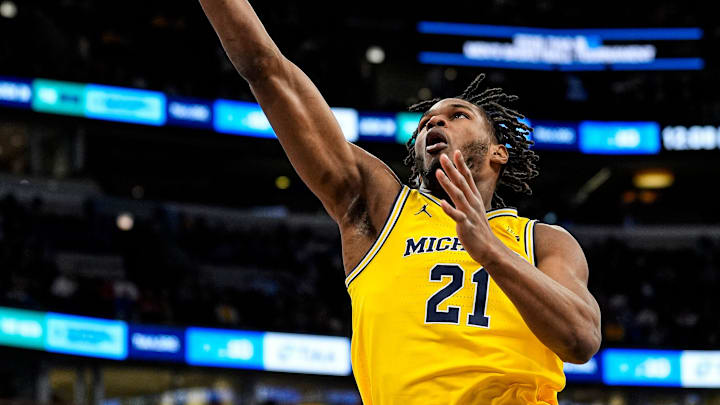 Michigan forward Morez Johnson Jr. (21) makes a layup against Wisconsin during the first half of the Big Ten Tournament semifinal at United Center in Chicago on Saturday, March 14, 2026.