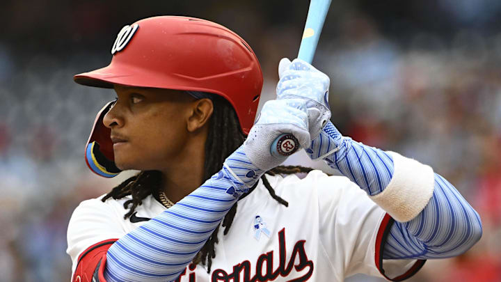 Jun 15, 2025; Washington, District of Columbia, USA; Washington Nationals shortstop CJ Abrams (5) uses a blue bat for Father’s Day against the Miami Marlins at Nationals Park. Mandatory Credit: Brad Mills-Imagn Images