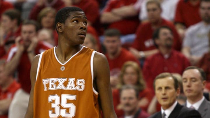 Jan 24, 2007; Lincoln, NE, USA;  Texas Longhorns forward Kevin Durant (35) looks to the clock with his head coach Rick Barnes in the background against the Nebraska Cornhuskers in the second half at the Bob Devaney Sports Center. Texas led at the half 31-28 and won 62-61. Mandatory Credit: Bruce Thorson-Imagn Images Copyright (c) 2007 Bruce Thorson