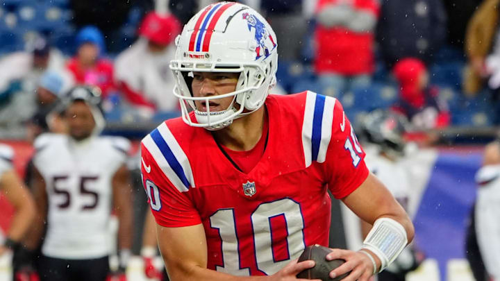 Oct 13, 2024; Foxborough, Massachusetts, USA; New England Patriots quarterback Drake Maye (10) runs with the ball against the Houston Texans during the second half at Gillette Stadium. Mandatory Credit: Gregory Fisher-Imagn Images