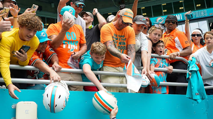 Miami Dolphins fans wait for autographs after the scrimmage at Hard Rock Stadium, Saturday, August