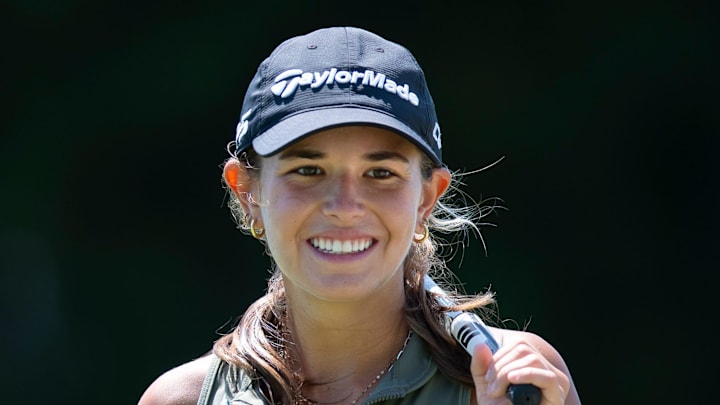 Kai Trump smiles after making a putt at the 41st Nicklaus Junior Championship at the Tequesta Country Club on June 23, 2025 in Tequesta, Florida.