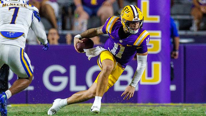 Oct 3, 2026; Baton Rouge, Louisiana, USA; LSU Tigers quarterback Landen Clark (11) scrambles against the McNeese Cowboys during the second half at Tiger Stadium. Mandatory Credit: Stephen Lew-Imagn Images Oct 3, 2026; Baton Rouge, Louisiana, USA; LSU Tigers quarterback Landen Clark (11) scrambles against the McNeese Cowboys during the second half at Tiger Stadium. Mandatory Credit: Stephen Lew-Imagn Images