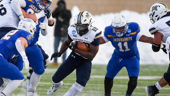 Montana State   s Isaiah Ifanse carries the ball in the FCS semifinal game against South Dakota State on Saturday, December 17, 2022, at Dana J. Dykhouse Stadium in Brookings, SD.

Fcs Semifinals 003