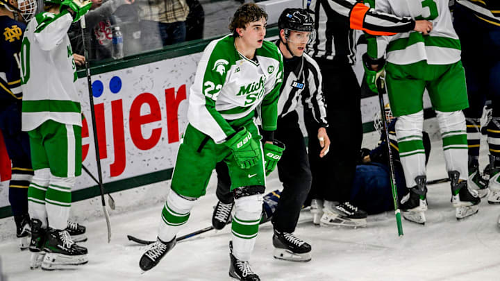 Michigan State's Porter Martone is escorted away from the scuffle during the second period in the game against Notre Dame on Thursday, Feb. 19, 2026, at the Munn Ice Arena in East Lansing. Michigan State's Porter Martone is escorted away from the scuffle during the second period in the game against Notre Dame on Thursday, Feb. 19, 2026, at the Munn Ice Arena in East Lansing.