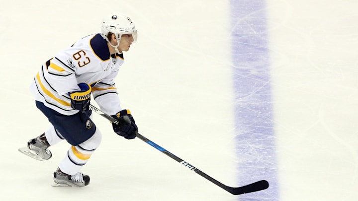 Mar 5, 2017; Pittsburgh, PA, USA;  Buffalo Sabres left wing Tyler Ennis (63) moves the puck up ice against the Pittsburgh Penguins during the second period at the PPG PAINTS Arena. The Penguins won 4-3. Mandatory Credit: Charles LeClaire-Imagn Images