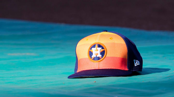 Apr 9, 2024; Kansas City, Missouri, USA; A general view of Houston Astros second base Jose Altuve (27) hat on the field during batting practice prior to a game against the Kansas City Royals at Kauffman Stadium. 