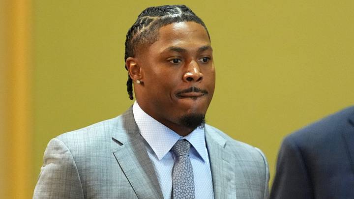 Green Bay Packers running back Josh Jacobs, right, appears in a Brown County courtroom on Sept. 10, 2026 in Green Bay, Wis., with his attorney Clarence Duchac III.