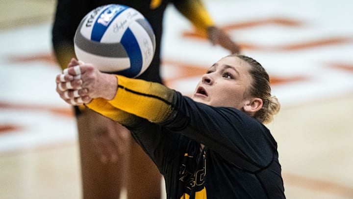 Missouri Tigers setter Marina Crownover (22), a former Texas Longhorn, bumps the ball during the Longhorns' match-up with the Missouri Tigers at the Gregory Gym in Austin, Nov. 1, 2024.