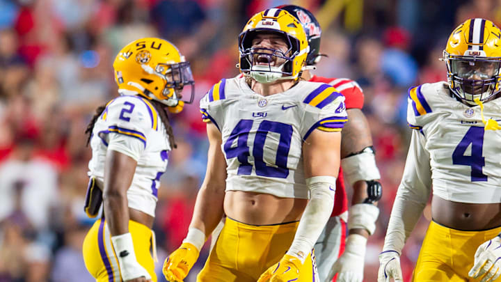 Linebacker Whit Weeks 40 sacks quarterback Jaxson Dart 2 as the LSU Tigers take on the Ole Miss Rebels at Tiger Stadium in Baton Rouge, LA. Saturday, Oct. 12, 2024.Saturday, Oct. 12, 2024.