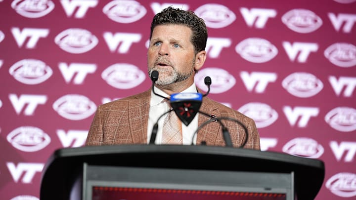 Jul 24, 2025; Charlotte, NC, USA;  Virginia Tech head coach Brent Pry answers questions from the media during ACC Media Days at Hilton Charlotte Uptown. Mandatory Credit: Jim Dedmon-Imagn Images