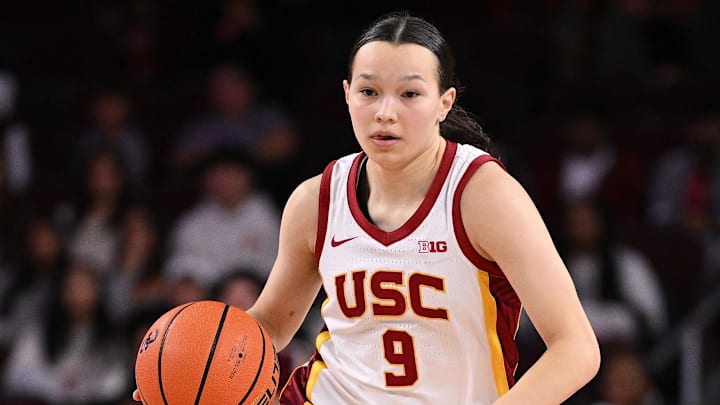 Jan 12, 2025; Los Angeles, California, USA; USC Trojans guard Kayleigh Heckel (9) brings the ball up the court during the fourth quarter against the Penn State Nittany Lions at Galen Center. Mandatory Credit: Robert Hanashiro-Imagn Images